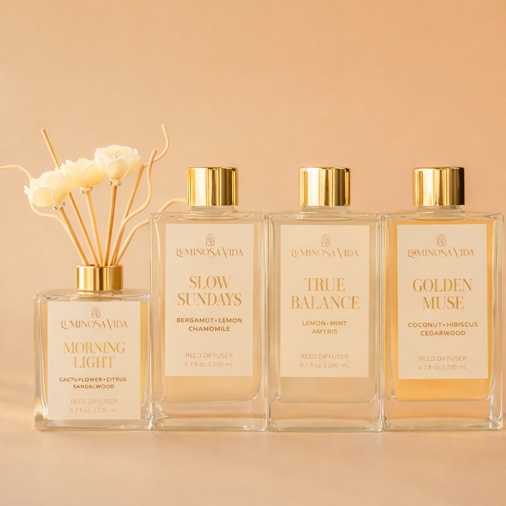 Luminosa Vida reed diffuser collection with Morning Light, Slow Sundays, True Balance, and Golden Muse fragrances.