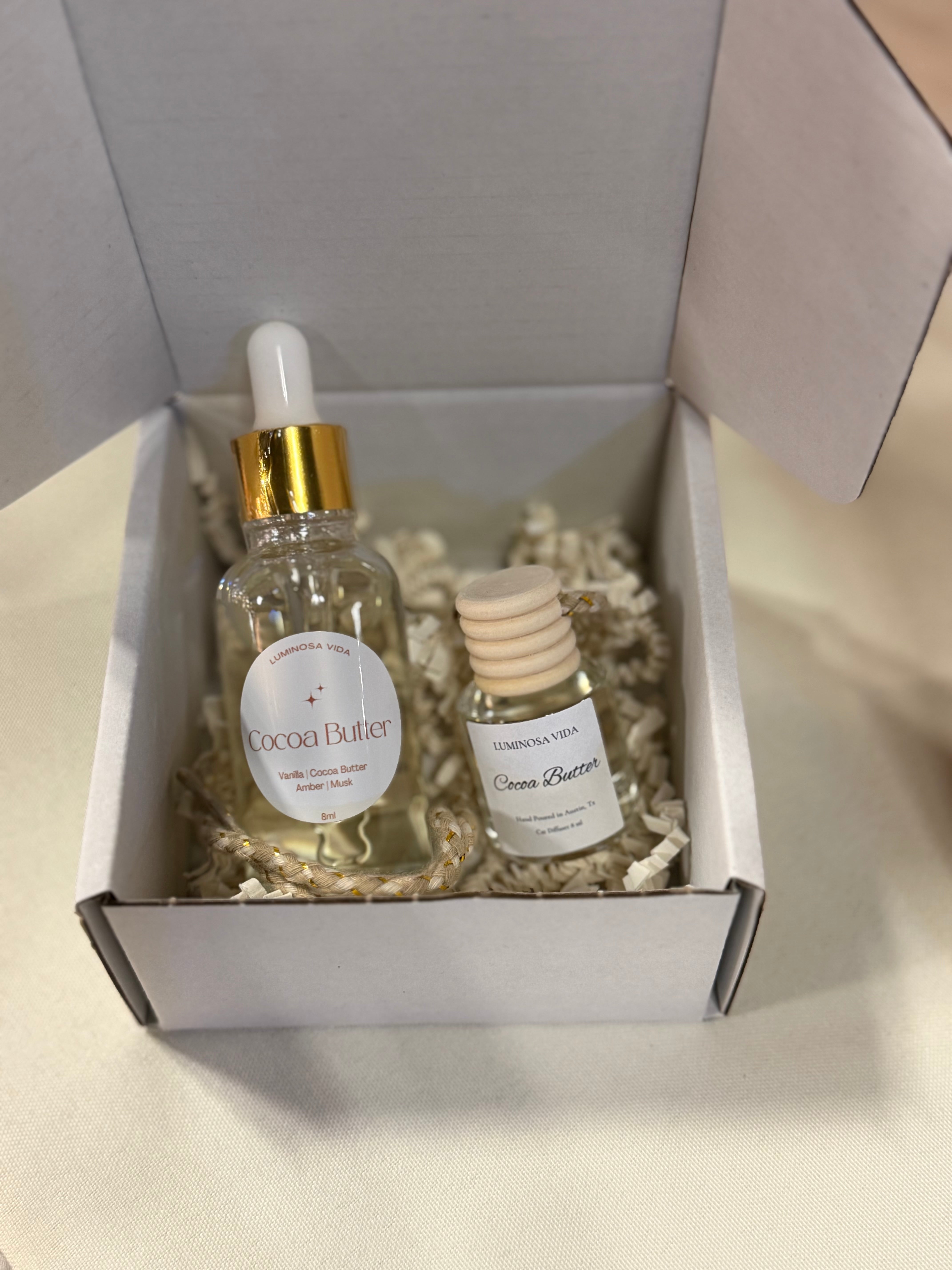 “Luminosa Vida Coconut Sandalwood 30 ml car diffuser refill bottle with gold dropper, displayed on a neutral beige background with soft leaf shadows.”