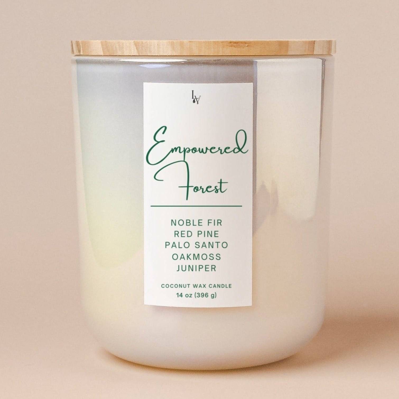 Empowered Forest Candle with calming scents in elegant packaging